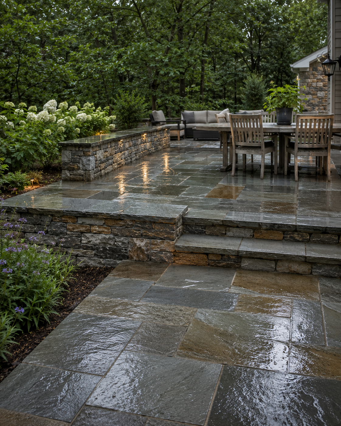 A finished outdoor space (patio, pool deck, or retaining wall) photographed in real Mid-Atlantic conditions
